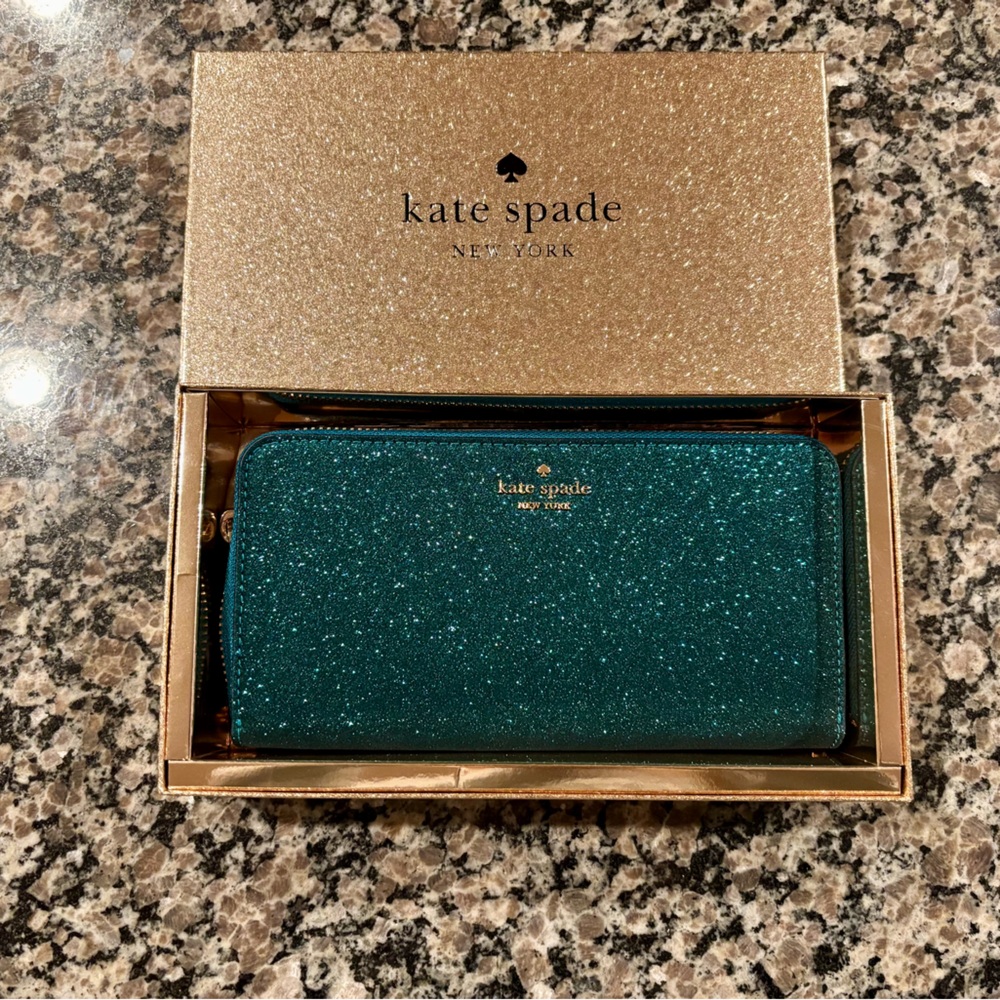 NWT and box Kate Spade boxed large continental wallet. Glitter green